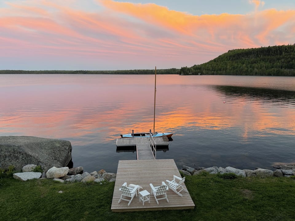 Panoramic sunset views from the private dock and seating area
