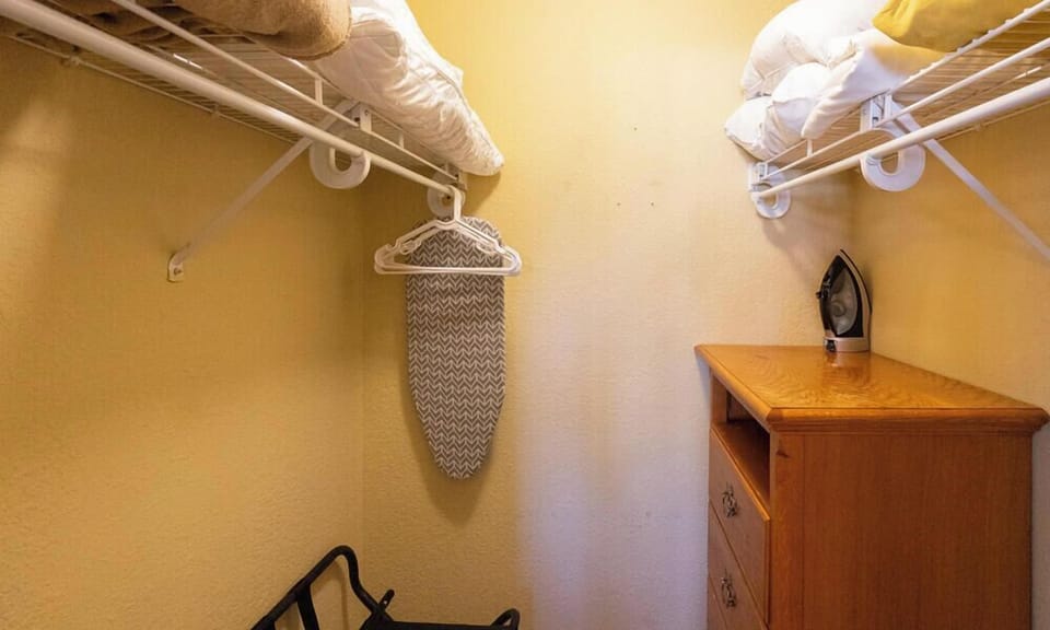Extra Blankets and Pillows in Master Walk in Closet