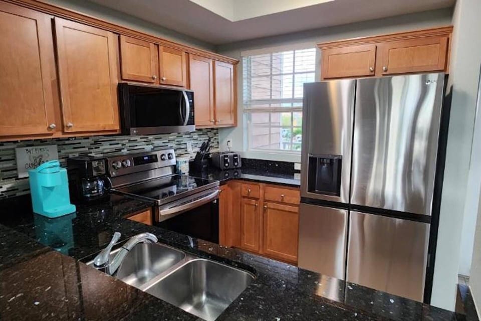 Newly Remodeled Kitchen With New Stainless Steel Appliances