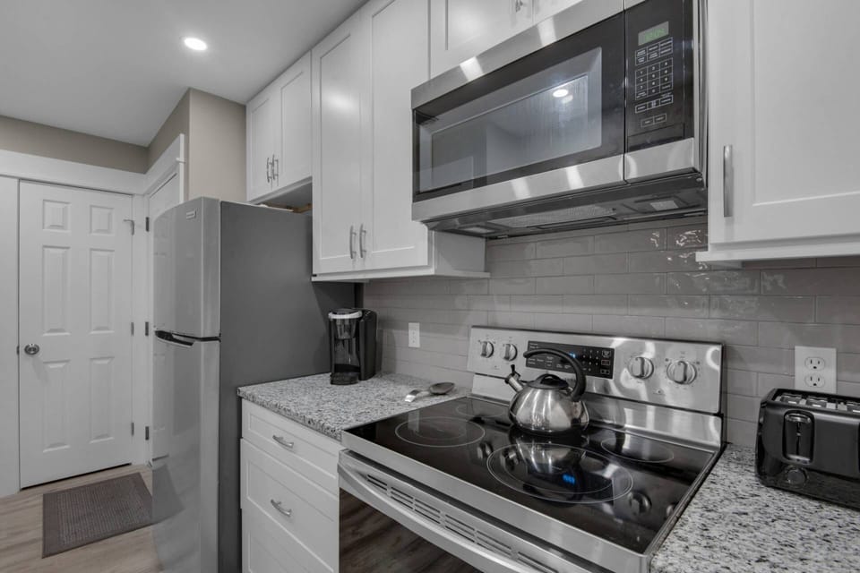 Fully equipped kitchen with stainless steel appliances