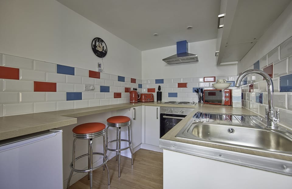 New kitchen with breakfast bar seating