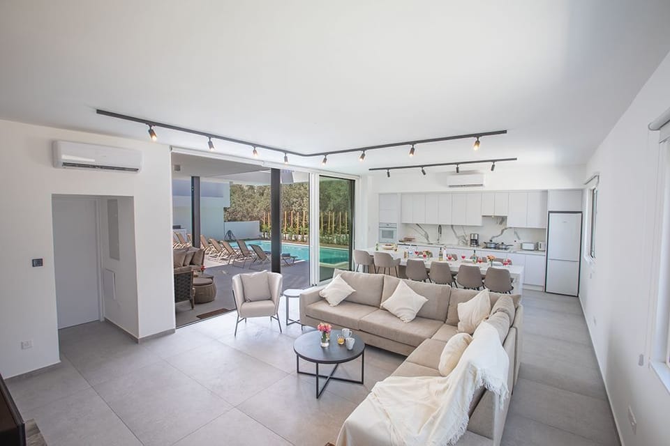 Spacious open-plan living room, kitchen and dining area