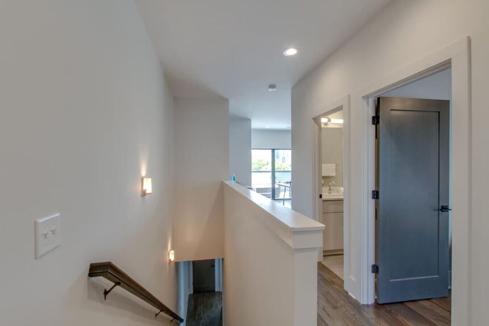 Another bright bedroom with twin beds and plenty of natural light.