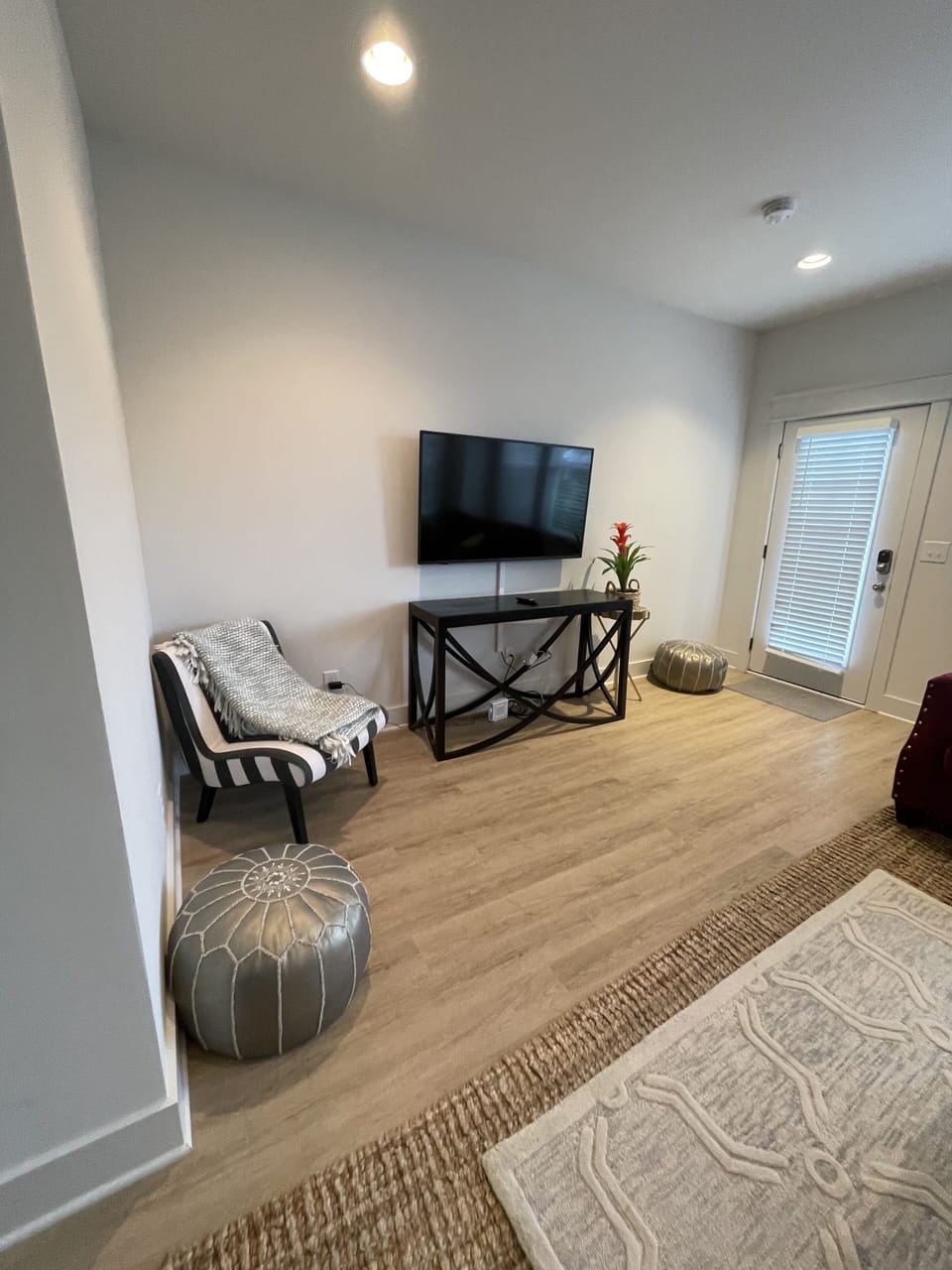 View of living room and front door.  
