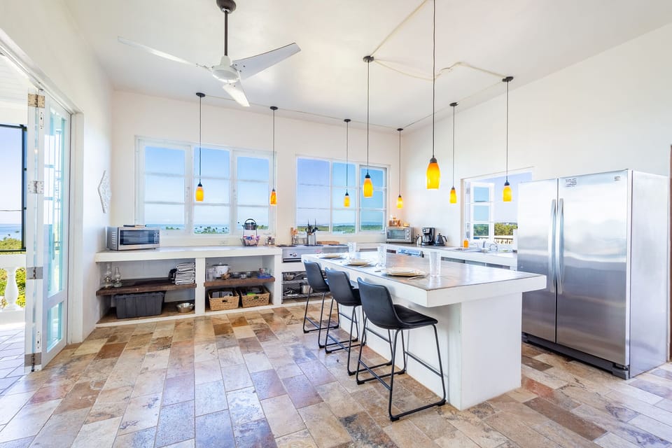 A large, bright, chef inspired kitchen with incredible views!