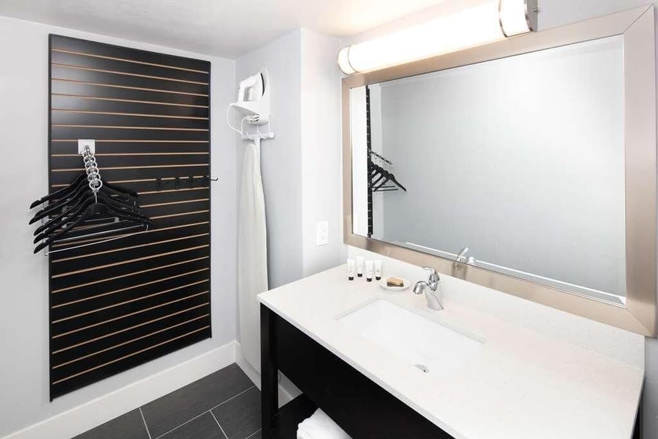 Freshen up at a bright vanity with plenty of counter space.