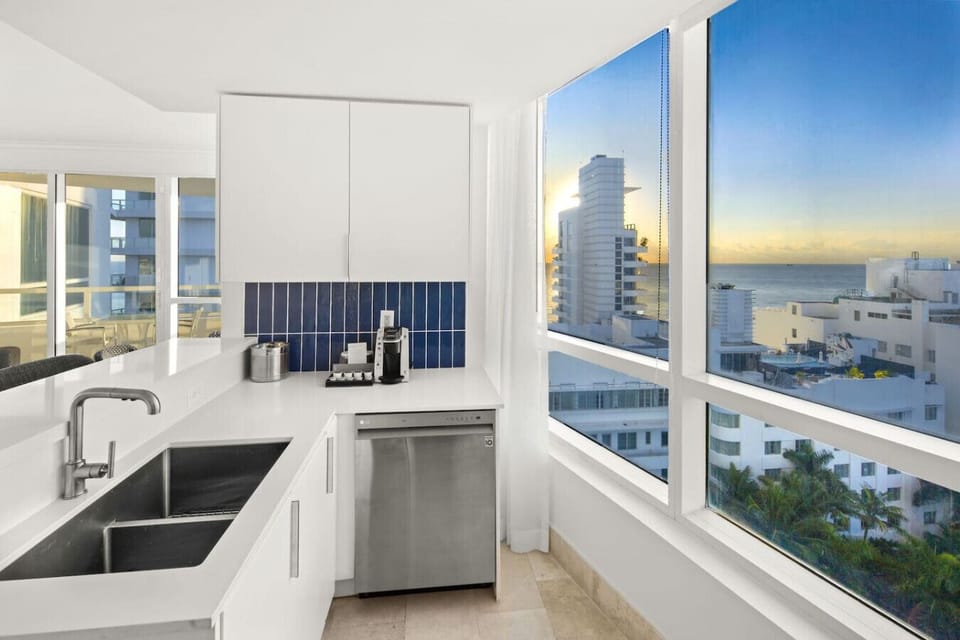 Fully stocked ocean view kitchen with new appliances, coffee machine, new utensils.