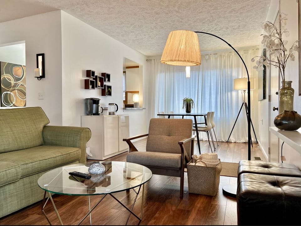 Living room, looking into Dining area and coffee bar. 