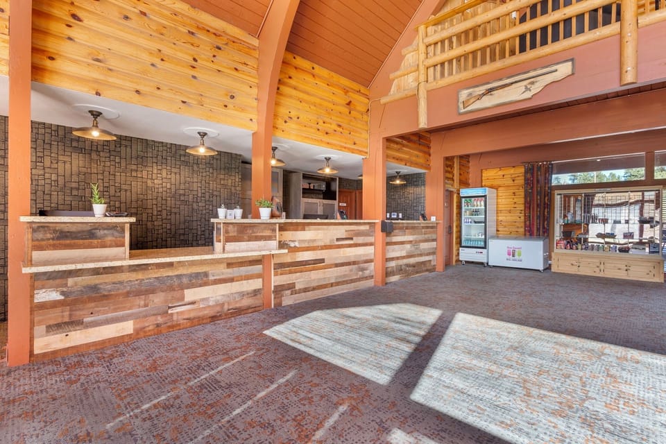 Arrive with ease at the warm, wood-front reception.