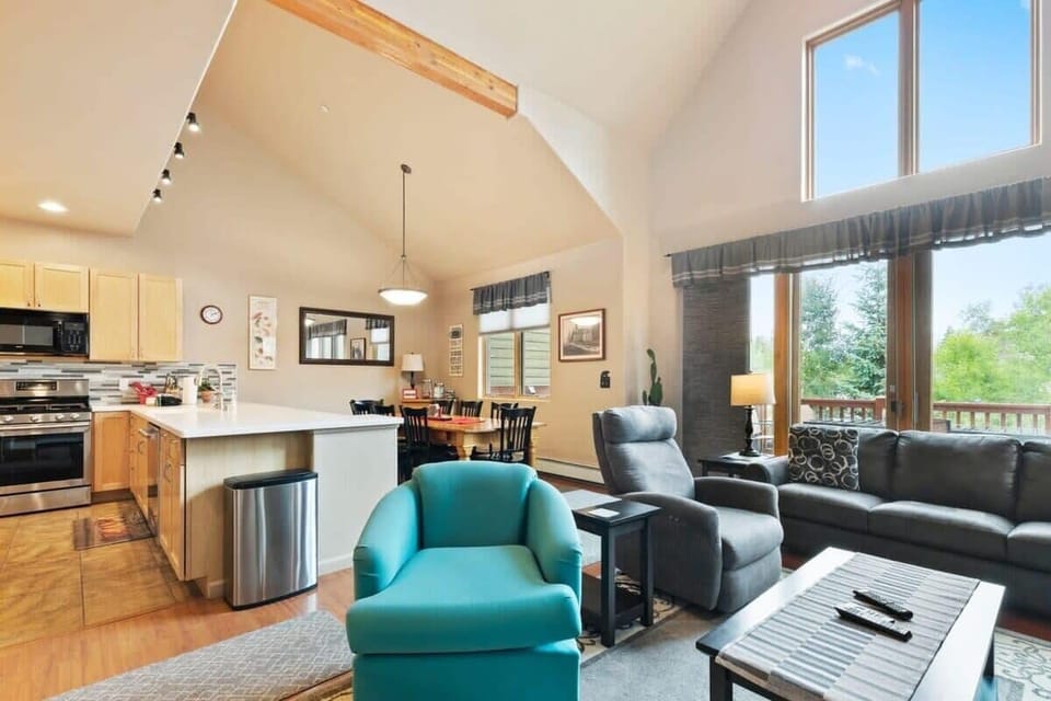 View of the family room, kitchen, and dining area