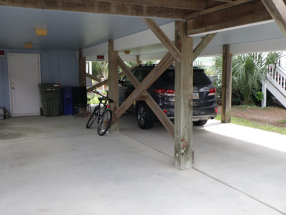 Plenty of room for parking. 3 cars of average size. Have outside shower.