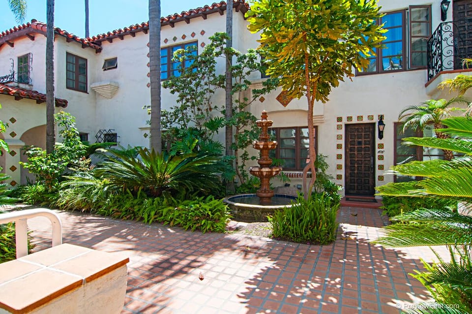 The peaceful fountain sounds fill the courtyard.