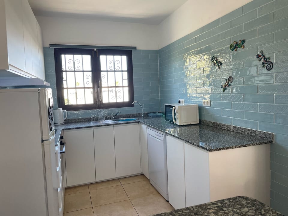 Full kitchen with dishwasher. Washing machine also included