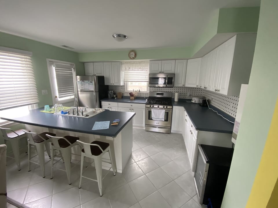 Fully stocked kitchen! Back door entry from shower.