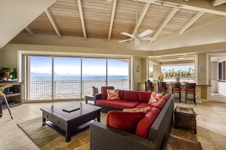 Breathtaking views of the ocean right from the couch—coastal comfort meets elegant design.