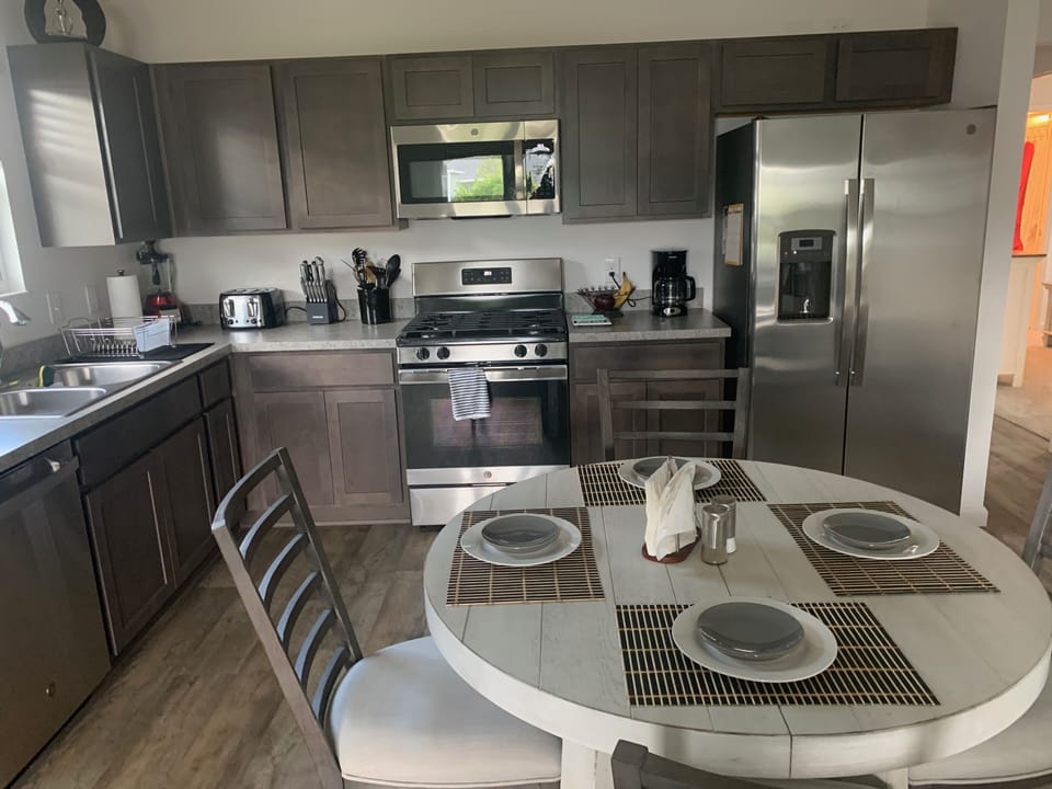Kitchen is stocked with everything you need for a comfortable stay.
