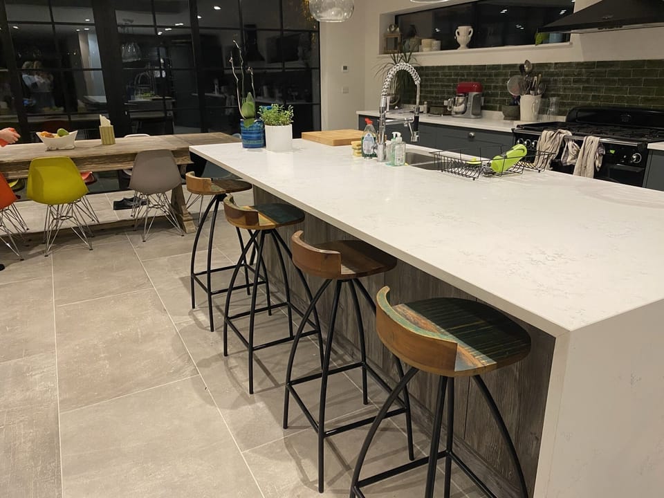 4 barstools and island