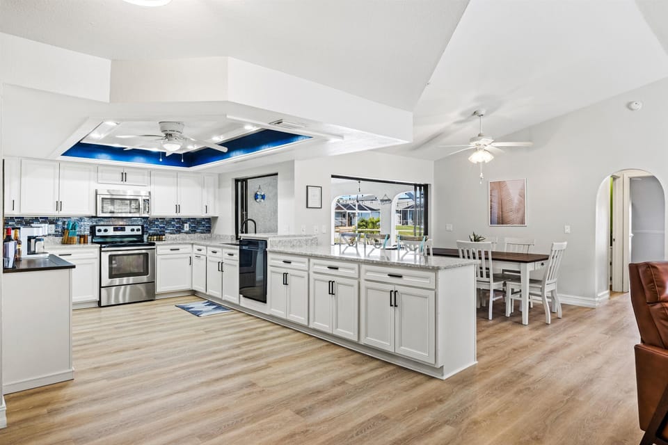 Large open concept kitchen with peninsula