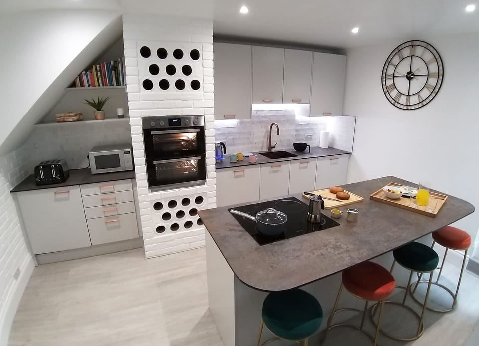 Induction hob, two fridges, two ovens, microwave, dishwasher & washing machine.