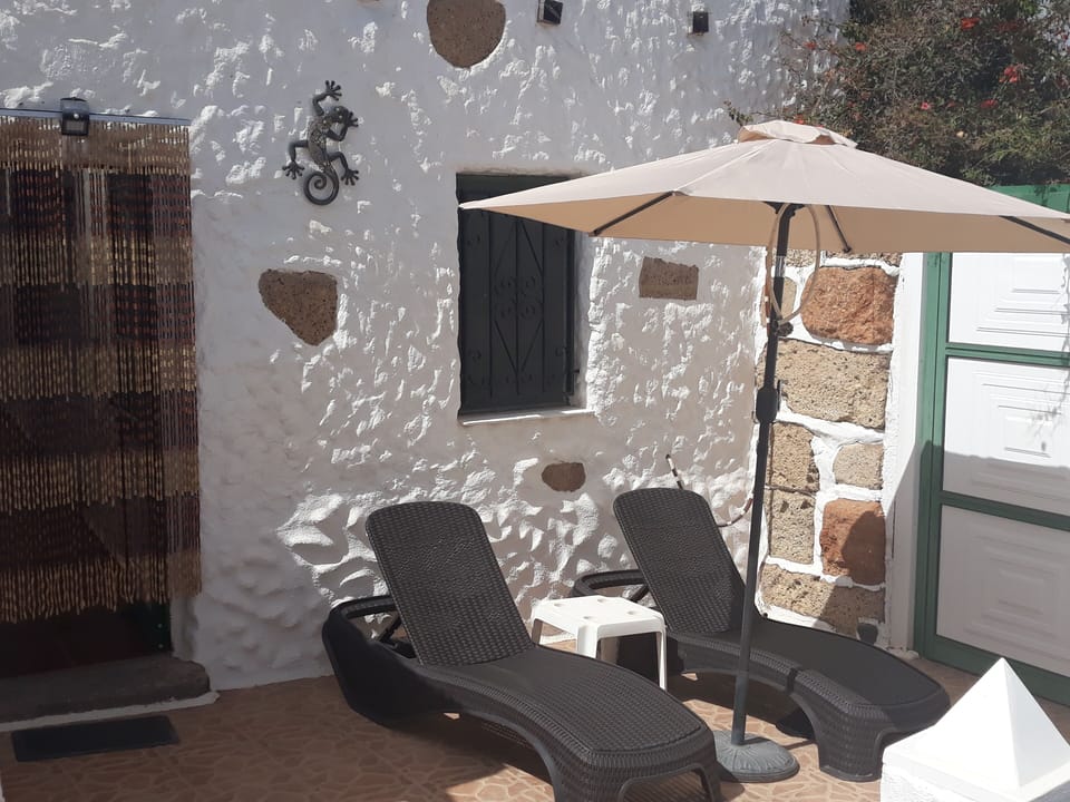 Sunloungers are ideally positioned on the middle terrace next to entrance gates