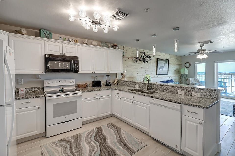 Kitchen - Full kitchen perfect for preparing your catch of the day!