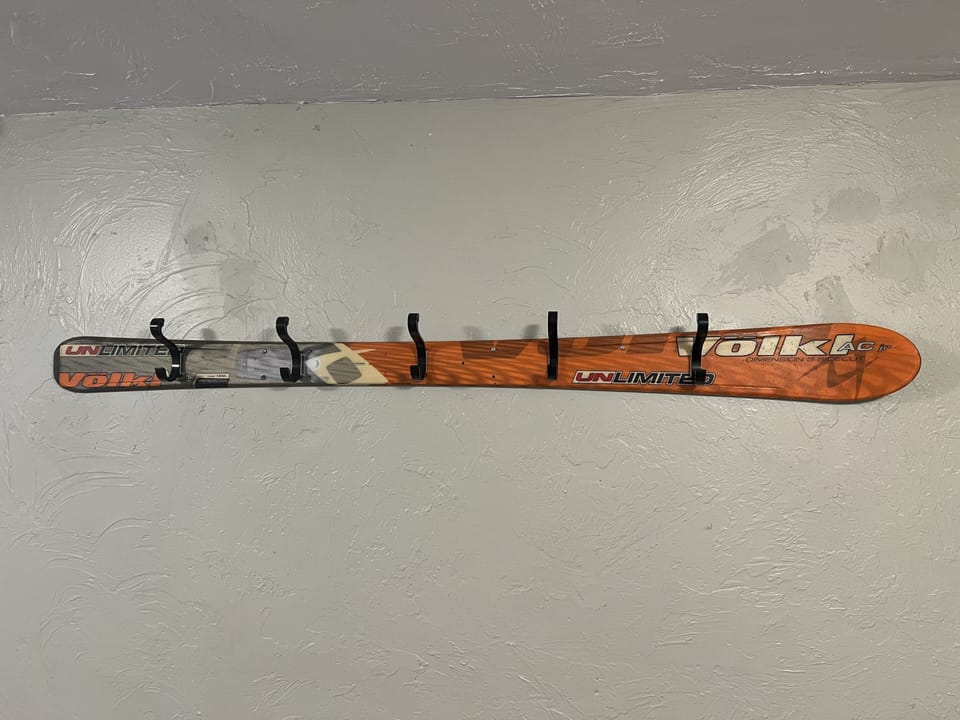 located in the spacious mud room, a fun place to hang your hiking or ski gear.