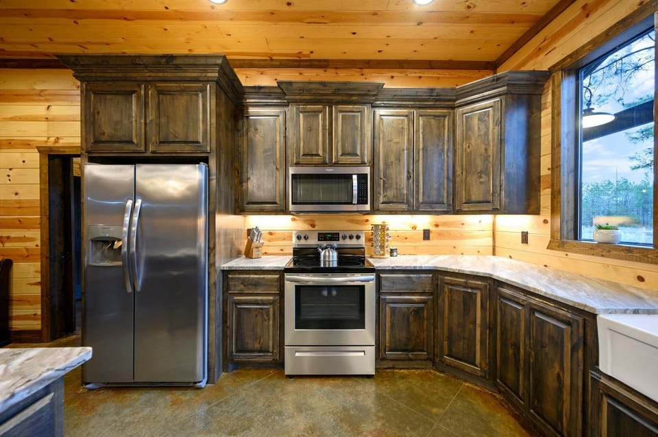 Fully equipped kitchen with stainless steel appliances, quartz counters, and everything you need for family-style meals.