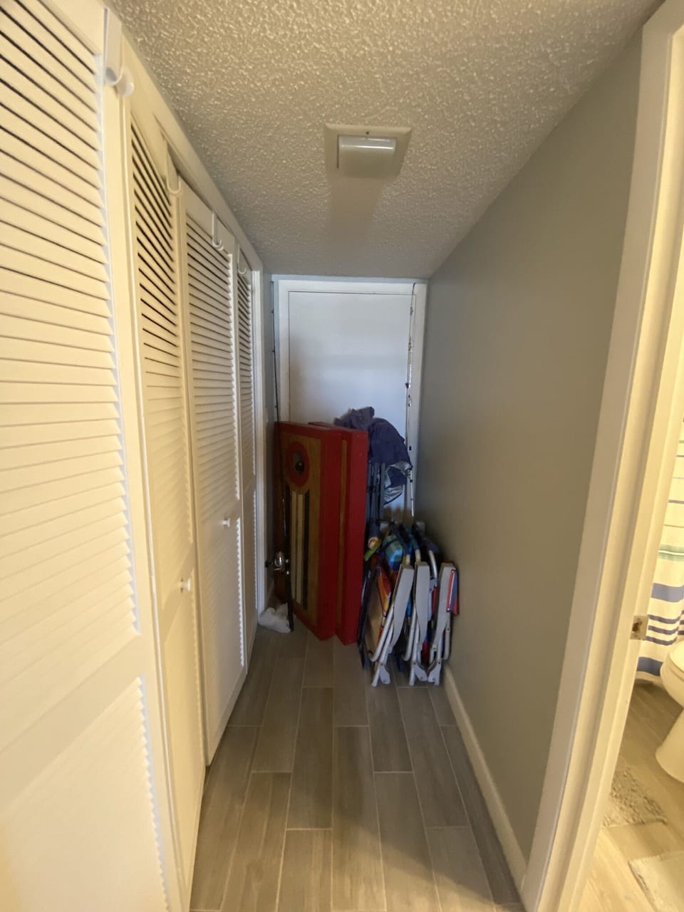 beach chairs, beach tent and corn hole