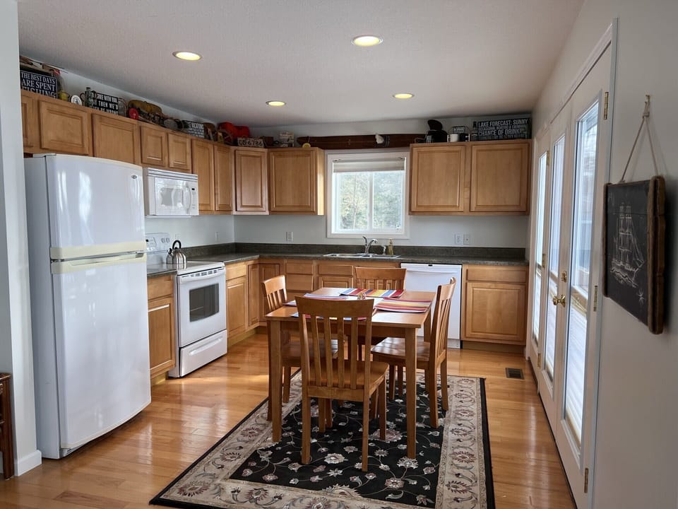 Hilltop House Kitchen with dishwasher, full size stove, microwave, and fridge