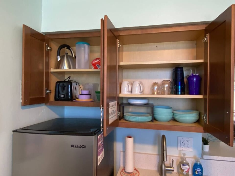 Plenty of plates and dishes.