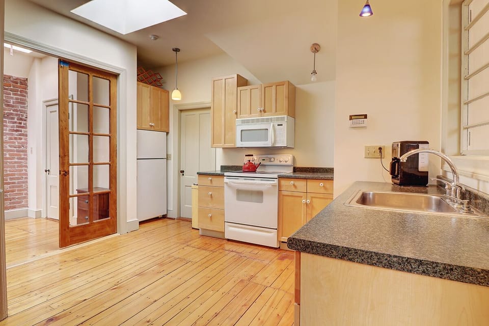 Kitchen/foyer includes dishwasher and a  well equipped kitchen
