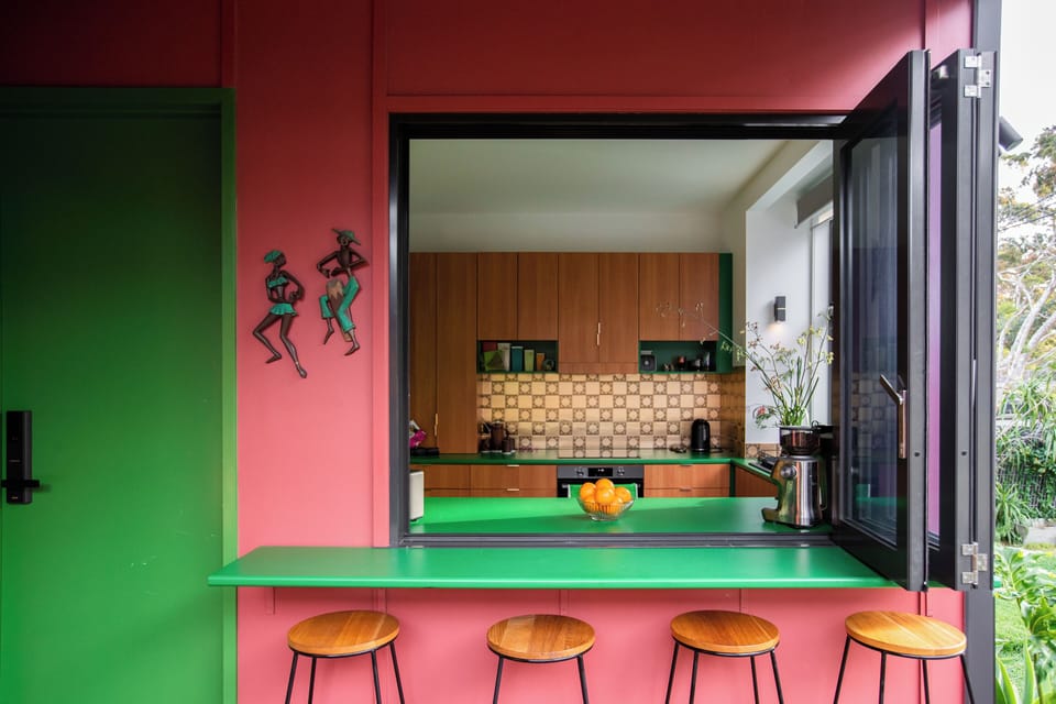 The kitchen servery creates a charming café vibe.