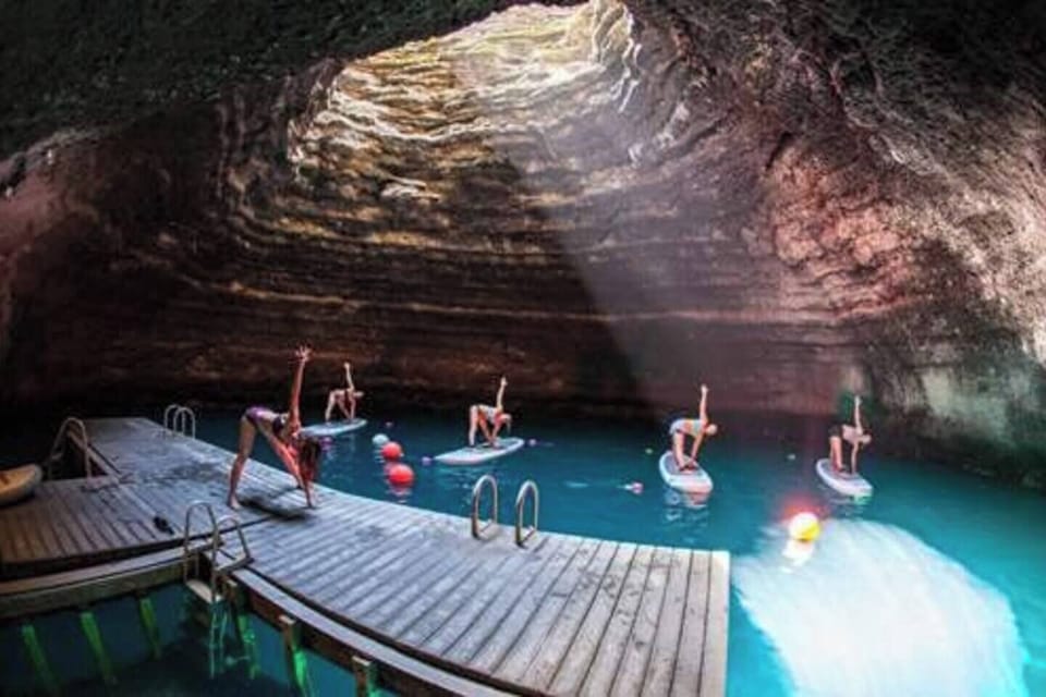 Soak or do paddleboard yoga in the Midway hot springs crater