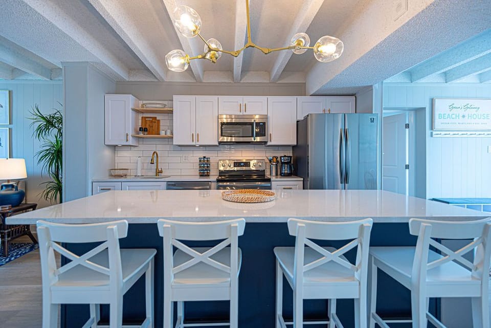 Fully equipped kitchen, with island that seats four.