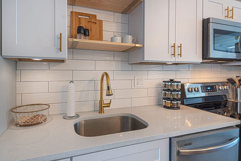 Kitchen details including fully equipped spice rack for the vacationing chef.