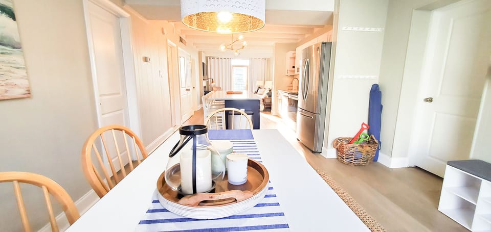 Full length view of the open living area from entry/dining area.