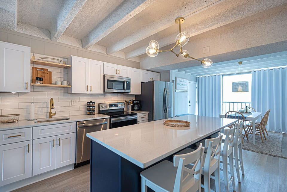 Kitchen view looking onto dining area.
