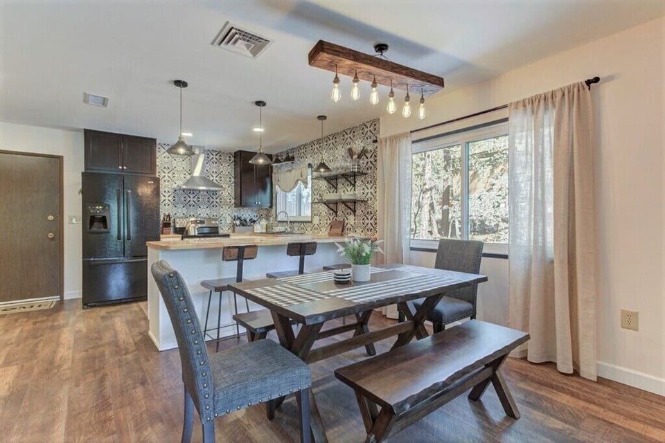 Dining table can sit 6 people comfortably and maybe 8 if they like each other!