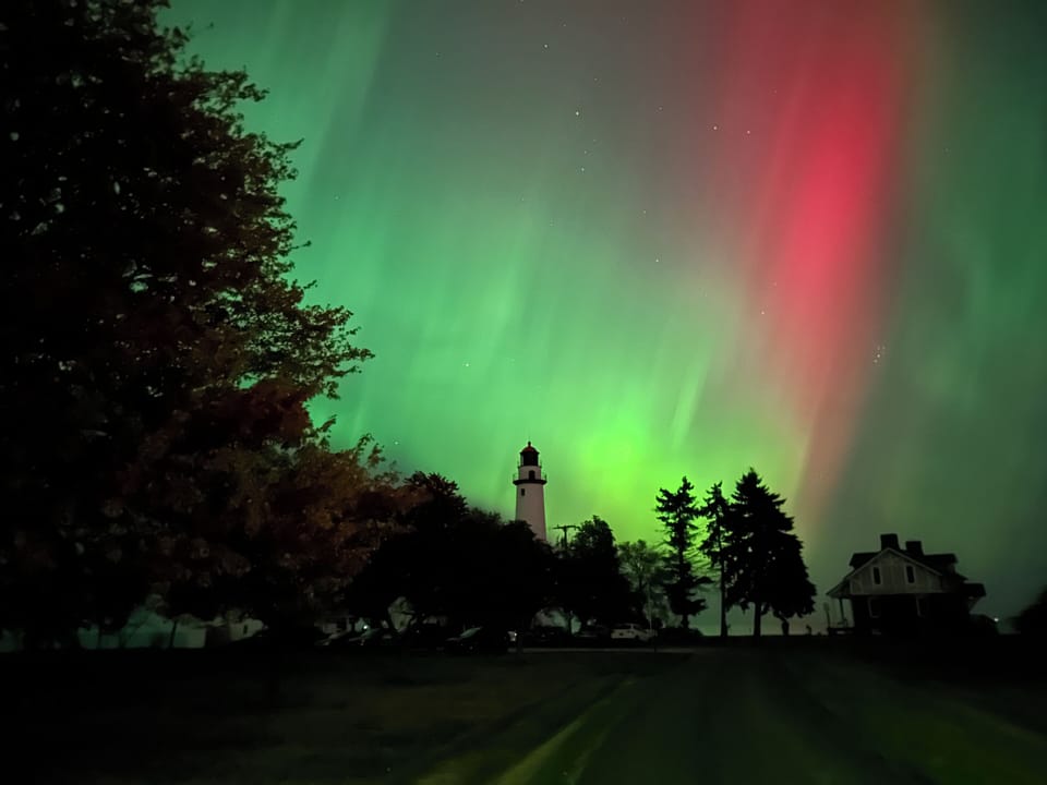 Pte. Aux Barques Lighthouse next door, with the Northern Lights show on 10/10/24