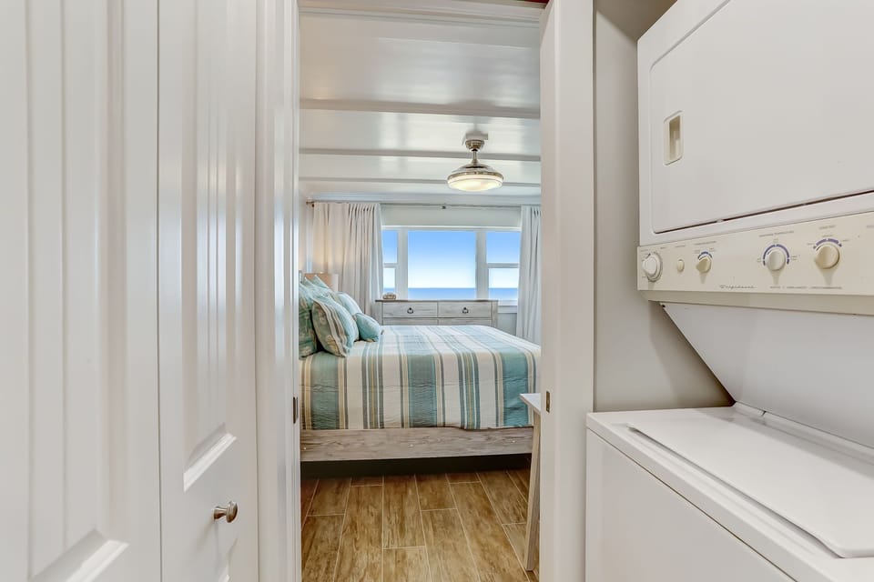 Laundry Area off of the Master with Stacked Washer/Dryer