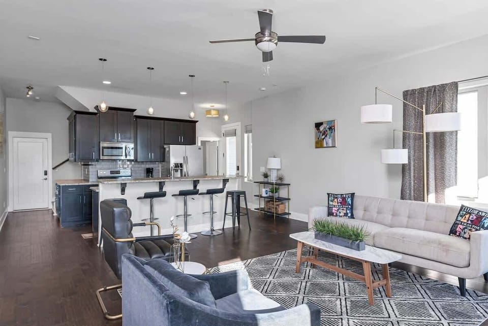 Stylish open-concept living room and kitchen for effortless entertaining.