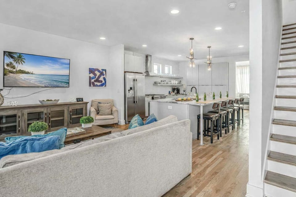 Welcome to Level 2, where an open-concept kitchen and stylish living room create the perfect space to relax during your downtown Nashville getaway near Broadway
