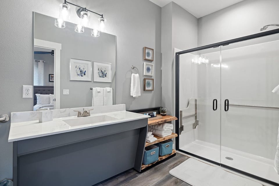An ADA-compliant bathroom adjoins the main-level ADA-compliant bedroom.