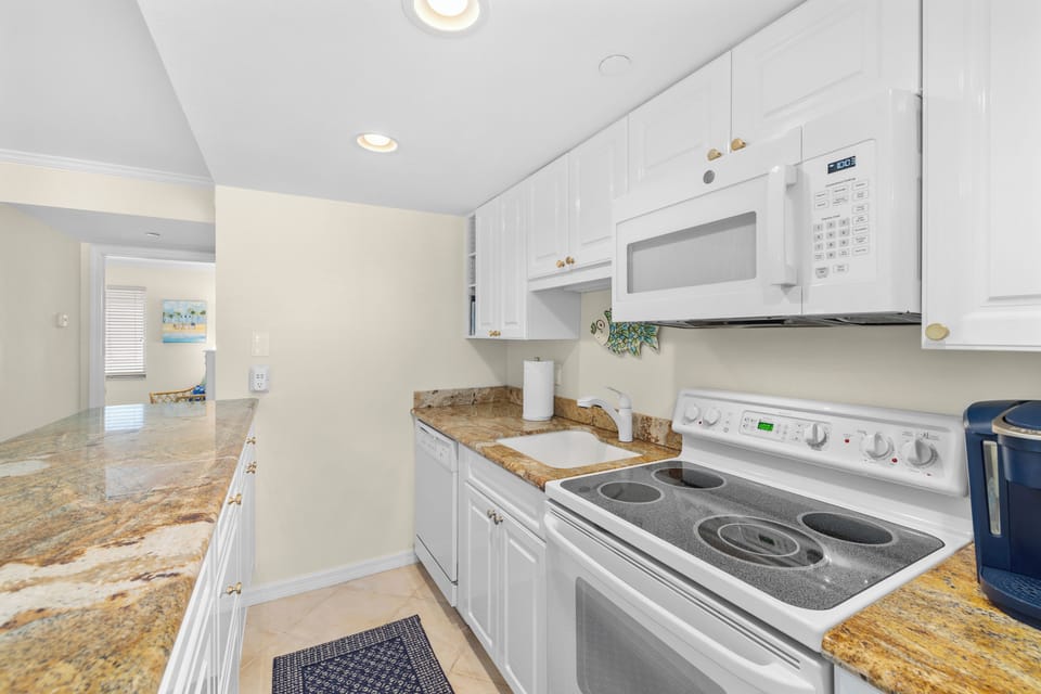 One will appreciate the fully equipped, CLEAN kitchen with plentiful storage.