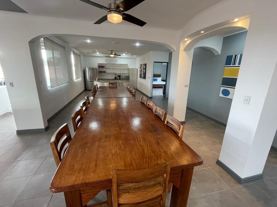 Huge custom dining table to enjoy group dinners. Book JacoVIP chef service! Yum