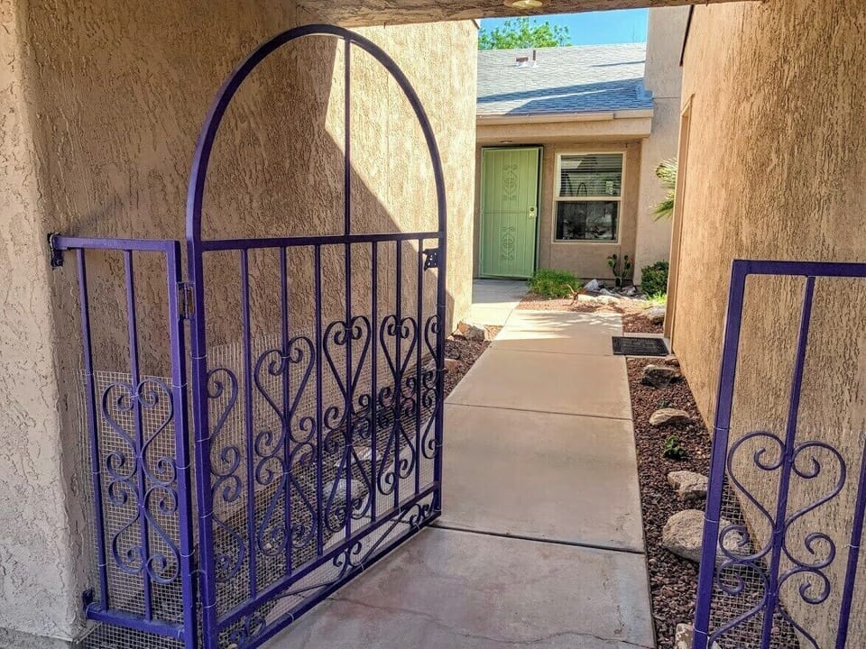 Front gate left of garage