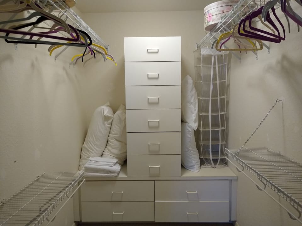 Master walk-in closet.  This is one of two closets in the master bedroom.