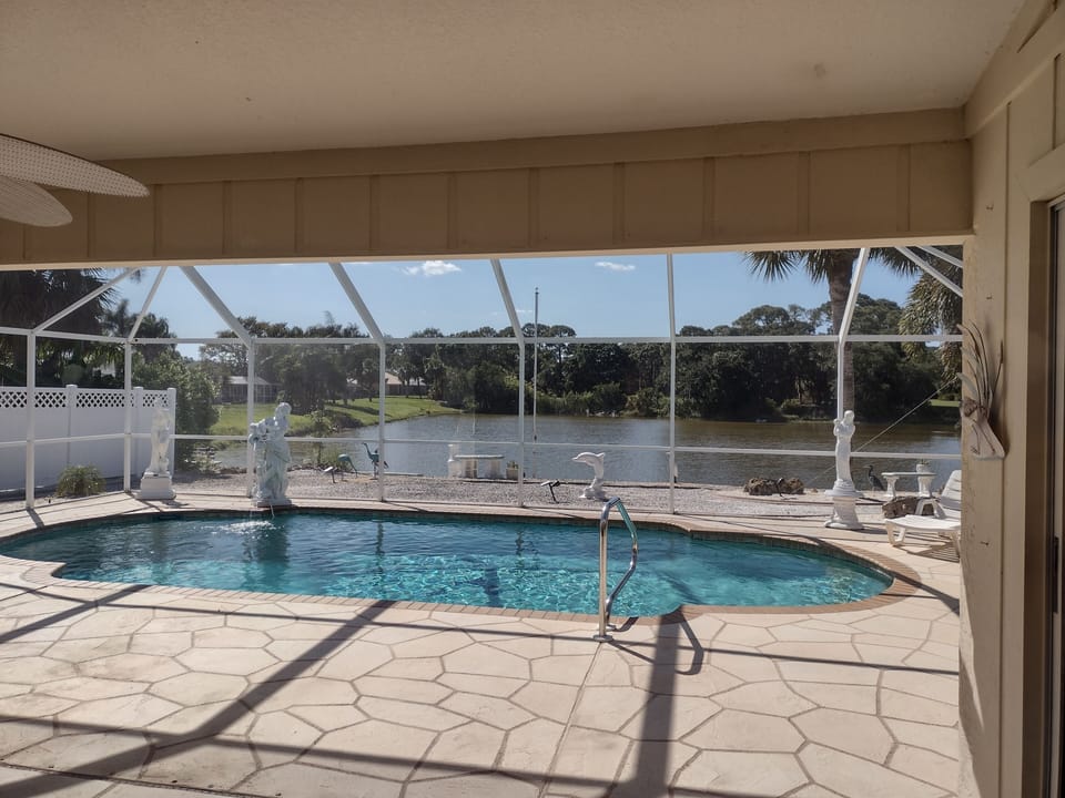 Take a dip in the large relaxing pool with a view of the lake and wildlife!