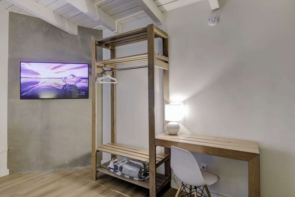 Storage Rack with Work Area and Desk and Smart TV