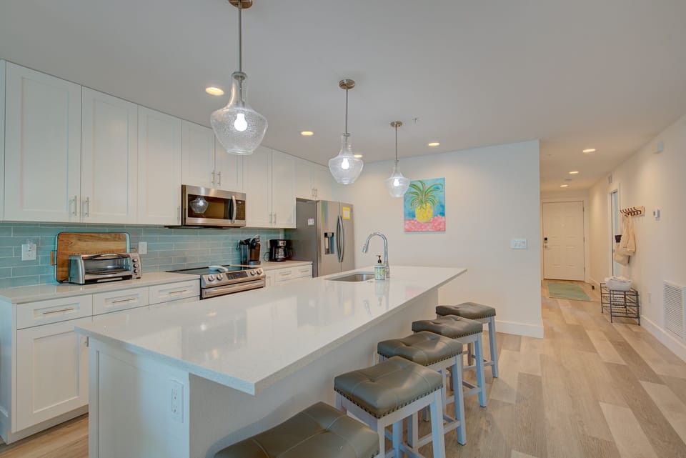 Quartz counter, stainless appliances & everything needed to cook or unwind